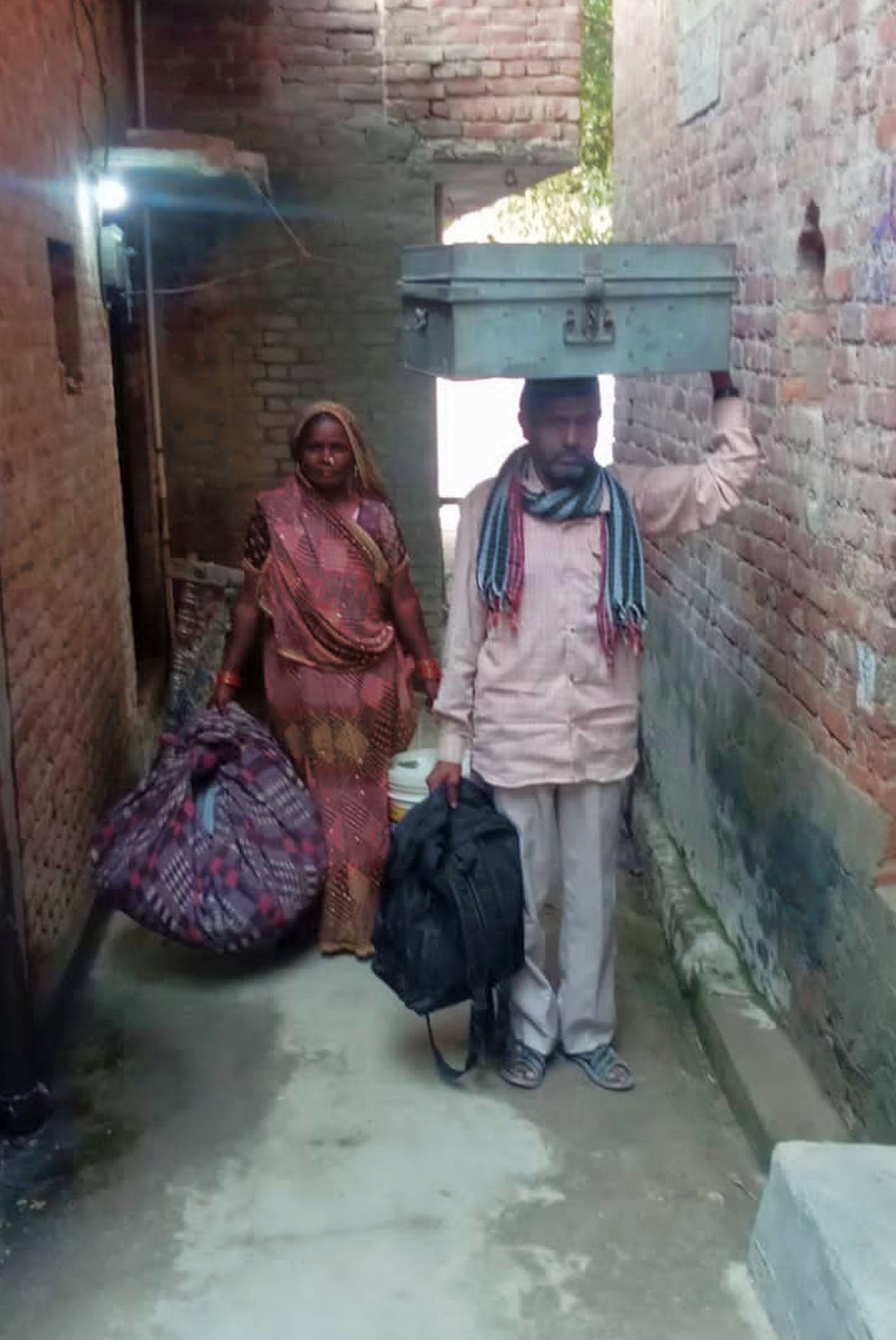 The bullies built a wall in front of the door, the helpless family left the house.