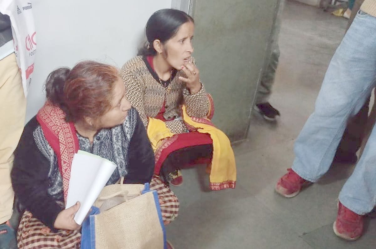 Queues formed outside OPD, patients sat on the cold floor when they got tired