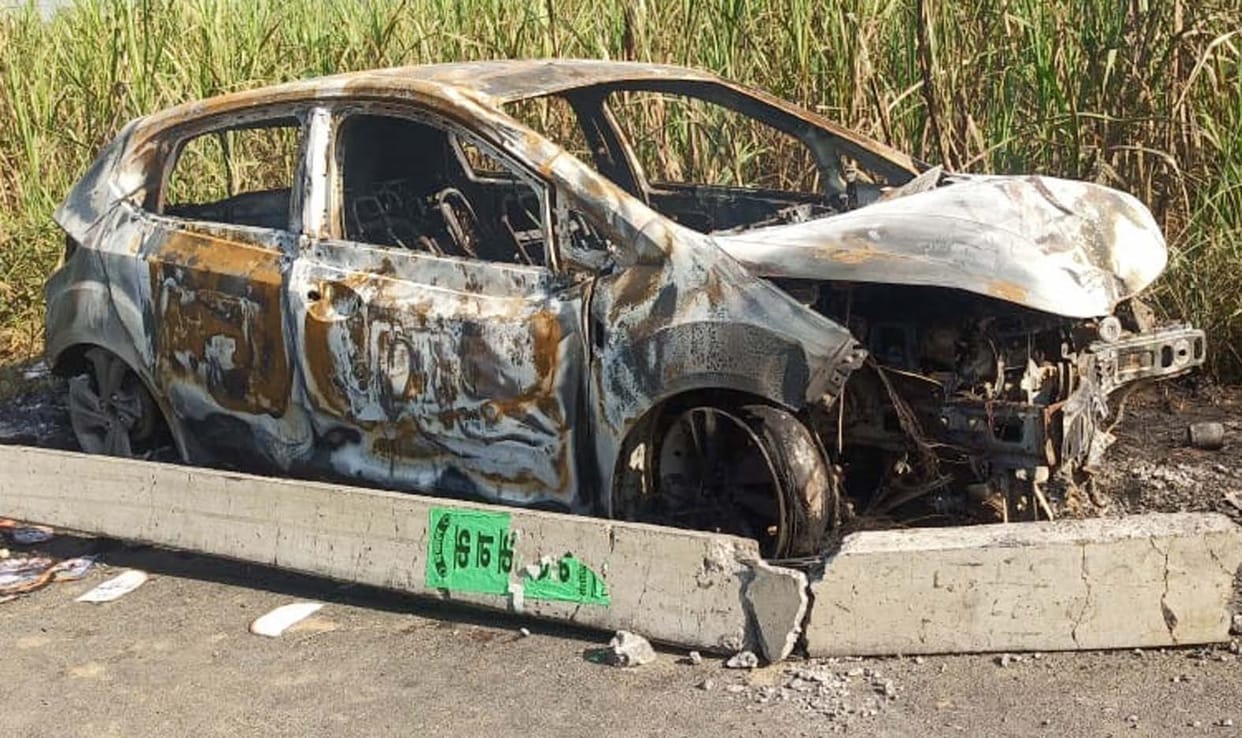 Car hits pole, catches fire, doctor couple narrowly escapes