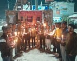 सेवरही में कैंडल मार्च निकालते राजपूत समाज के लोग।