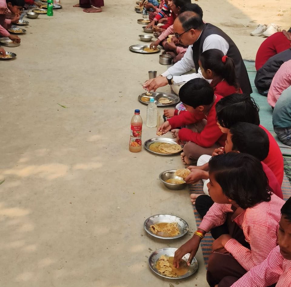 Ate mid day meal with children