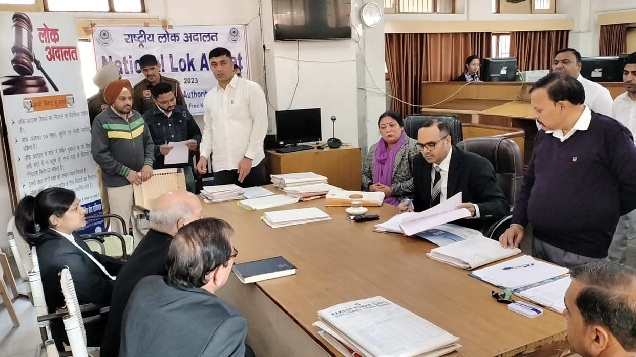 Disposal of 9,307 cases in National Lok Adalat