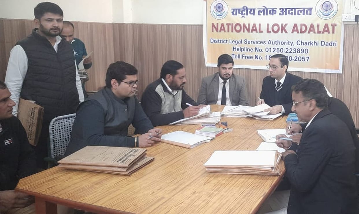 After hearing 3633 cases in Lok Adalat, 3215 were disposed of