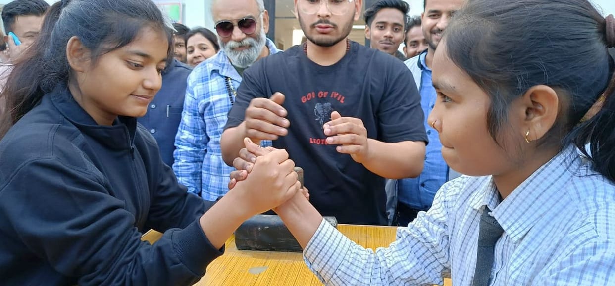 Badminton, running and arm wrestling competitions took place