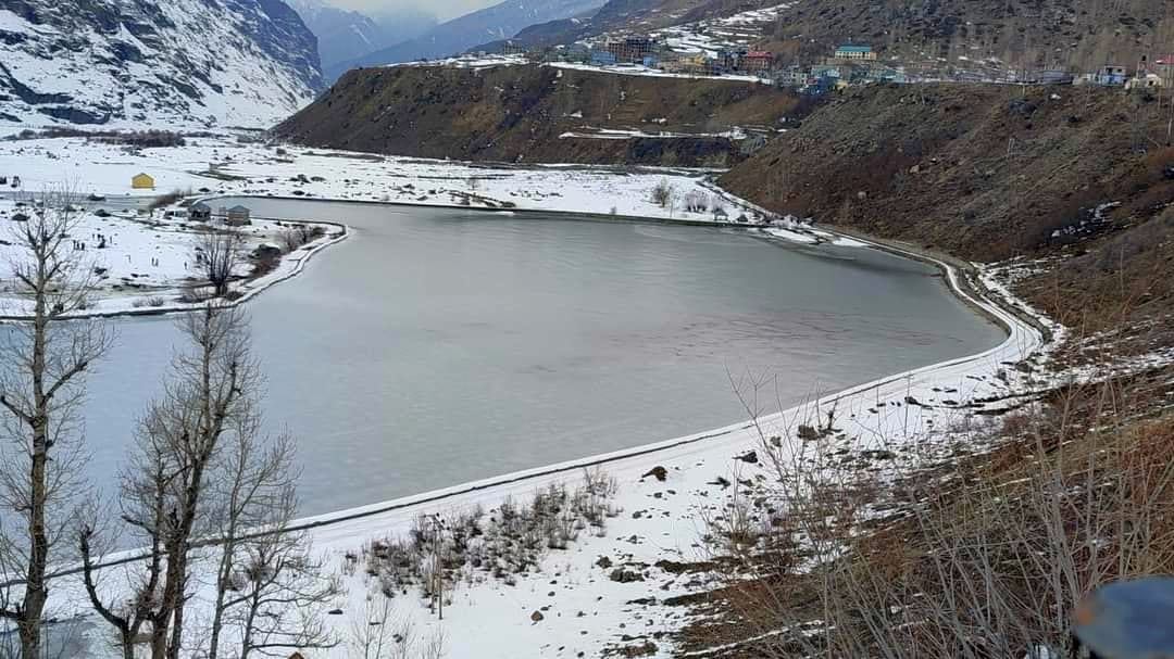 Lakes frozen due to falling temperature, tourists taking selfies, people hiding in homes