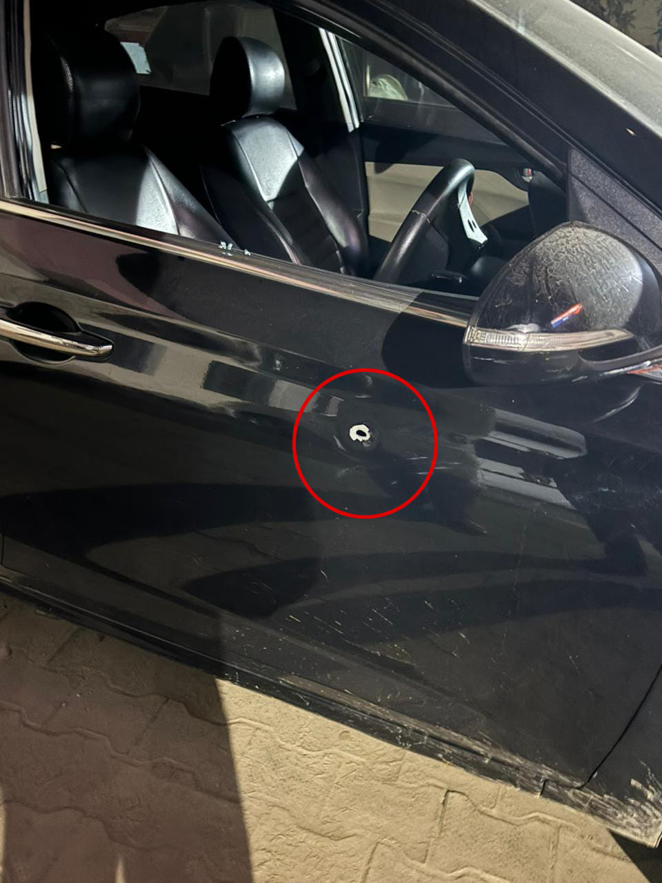 Firing on liquor contractor due to old rivalry, bullet hit the car