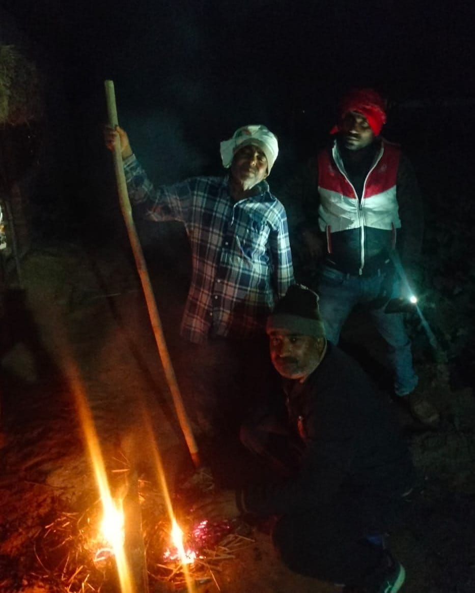 Farmers staying awake all night in the cold worrying about the crop