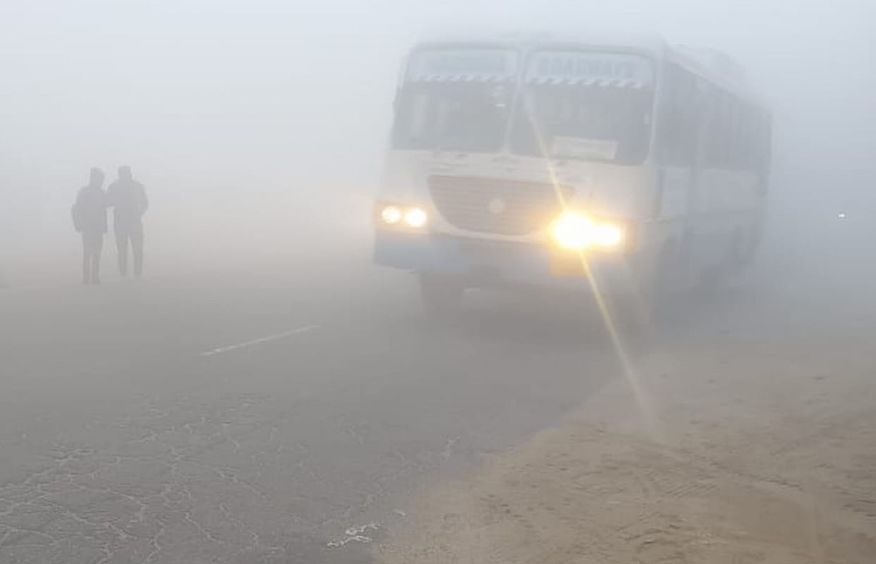 Visibility remained less than 20 meters due to dense fog, vehicles moved crawling