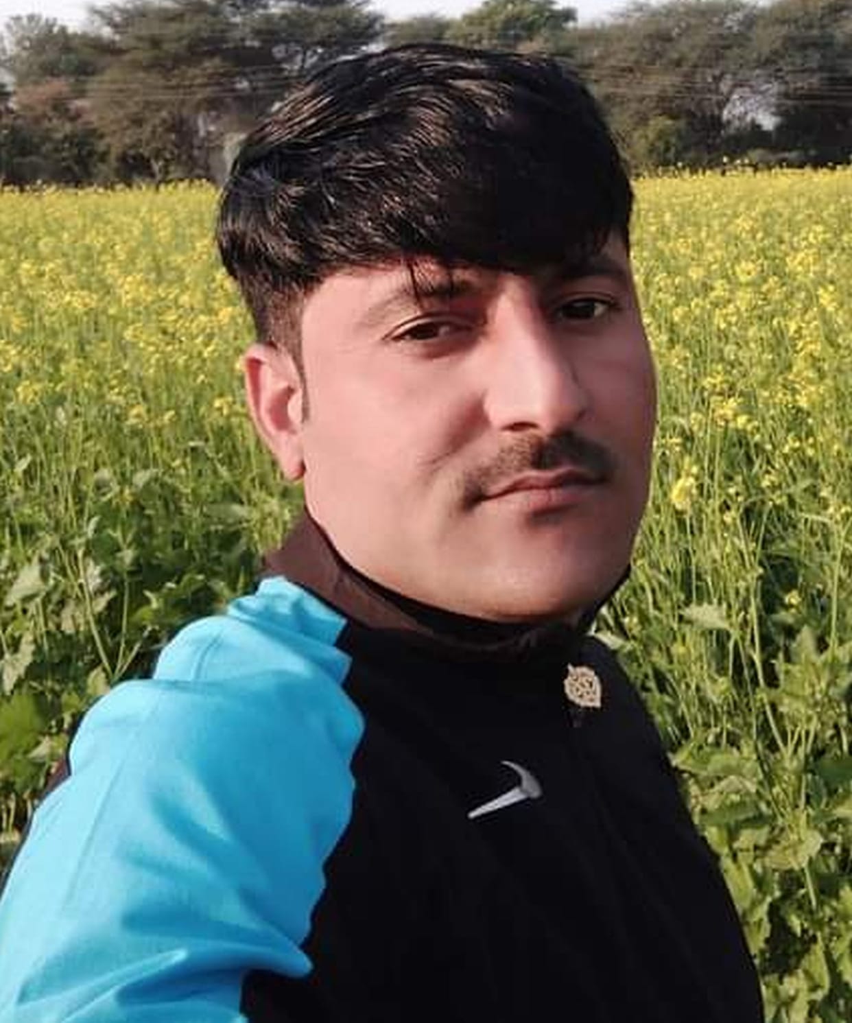 Son shot three times in front of father, dies
