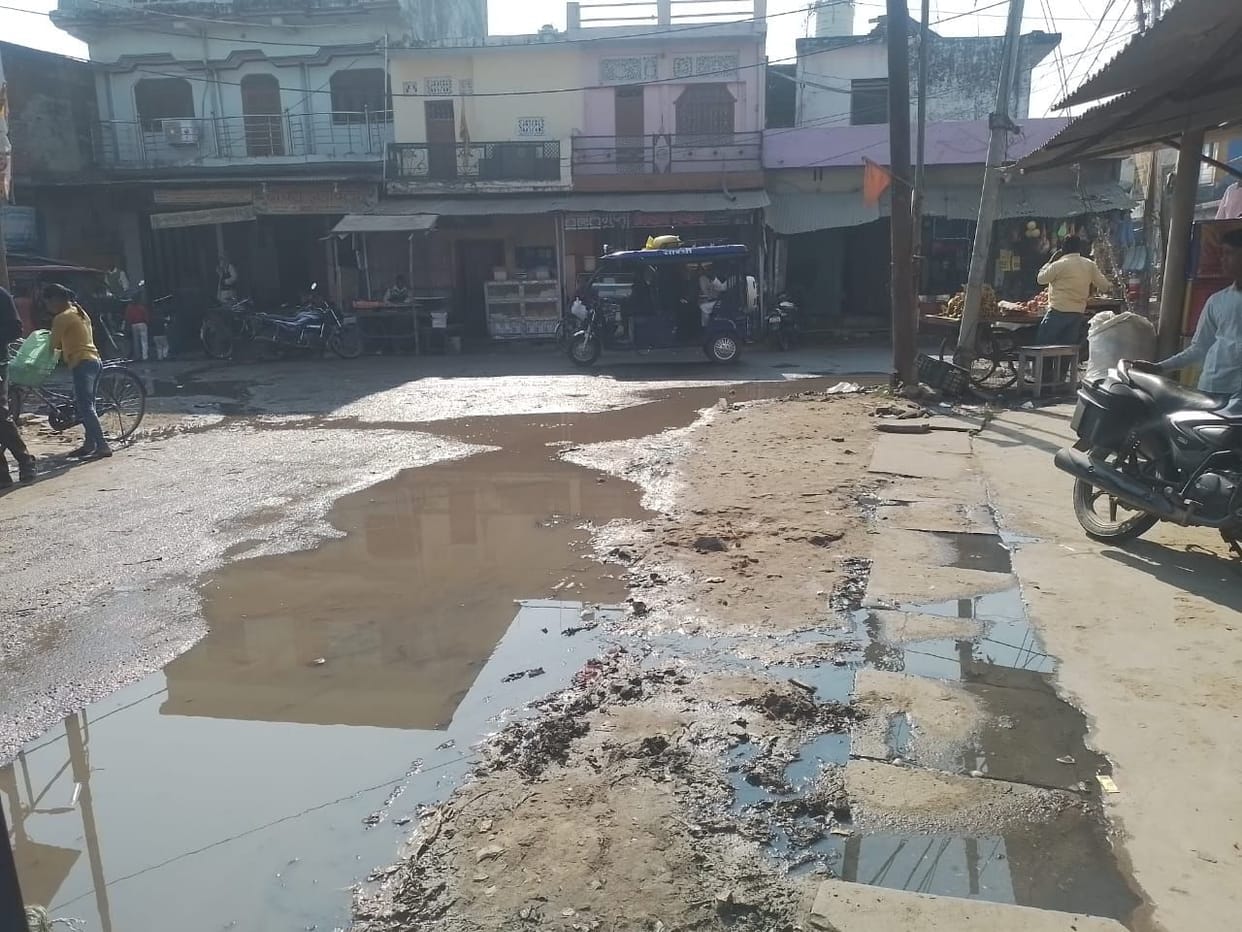 Dirty water flowing on the road, trouble
