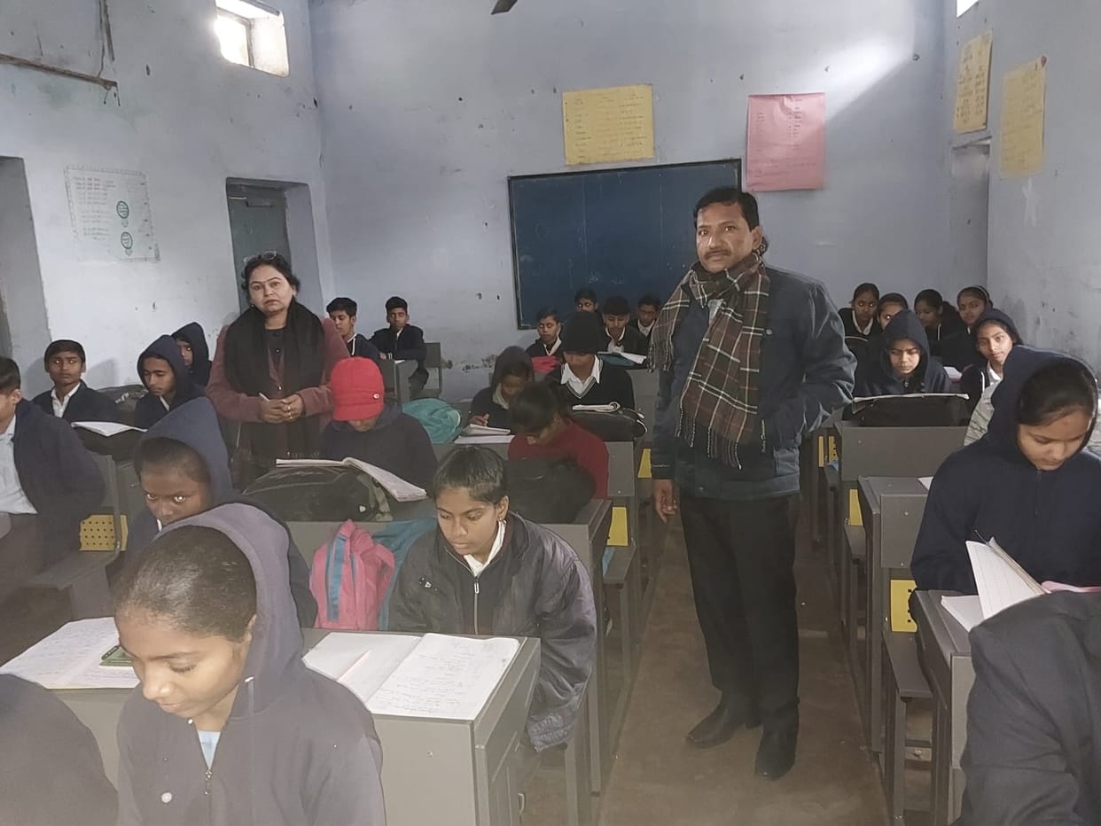 Students sitting at dual desks in Misri Government School.