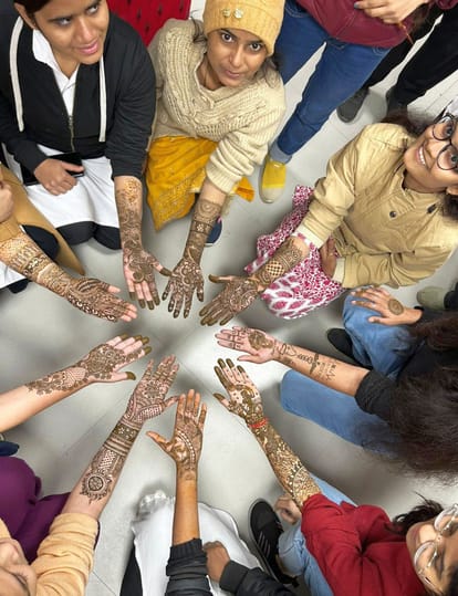 Manali stood first in mehndi competition and Maryam stood first in essay.