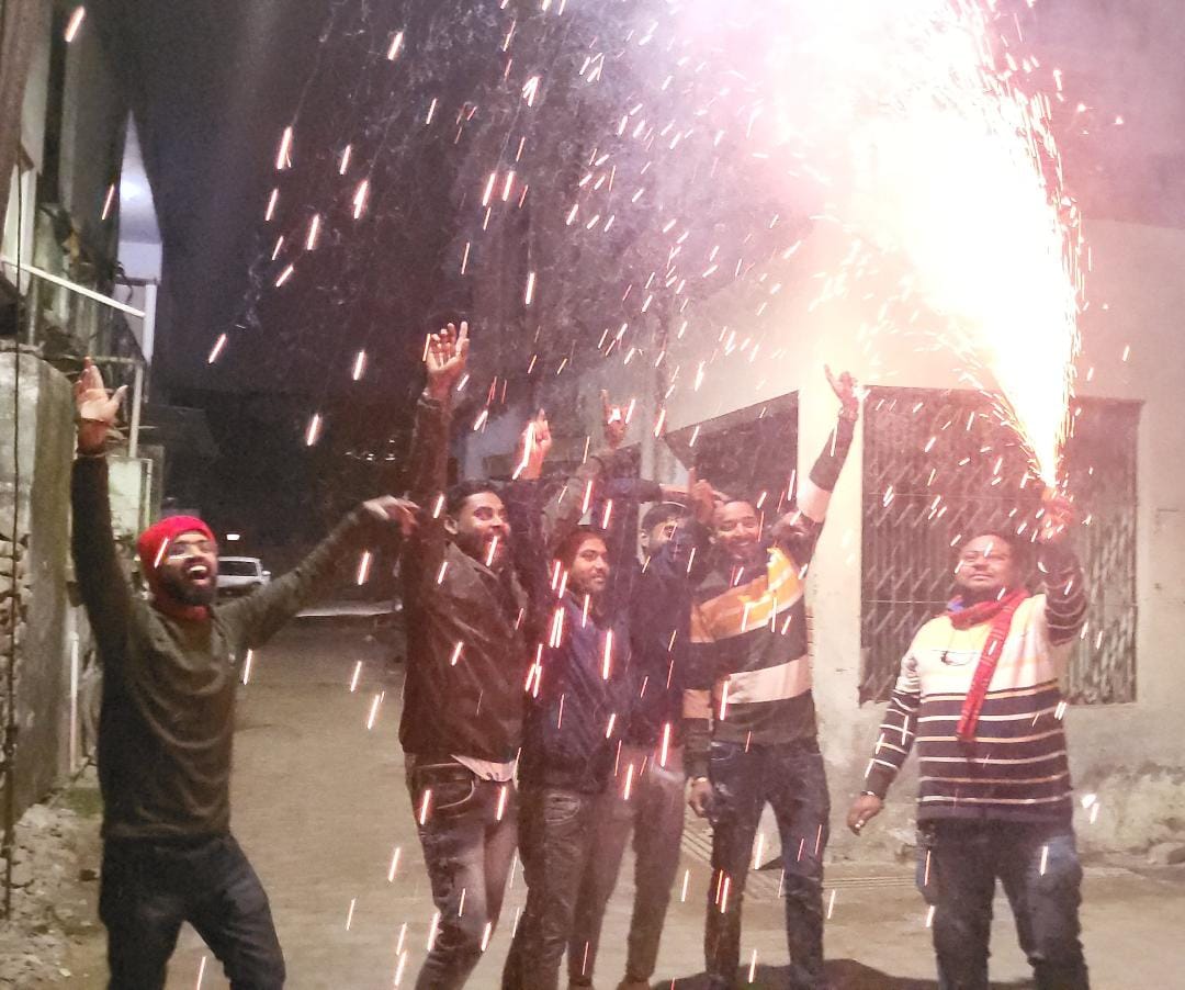 At 12 o'clock burst crackers... said - Happy New Year friend