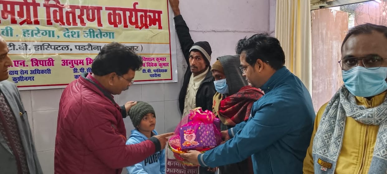 First class student gave nutrition packet to TB patient