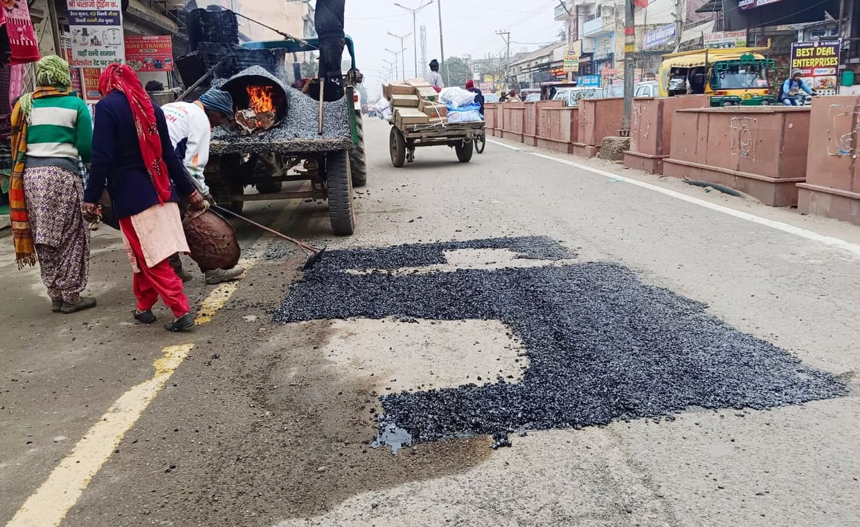 The work of patching the potholes on the railway road has started.