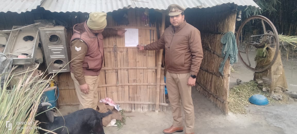 Attachment notice pasted at the house of absconding accused