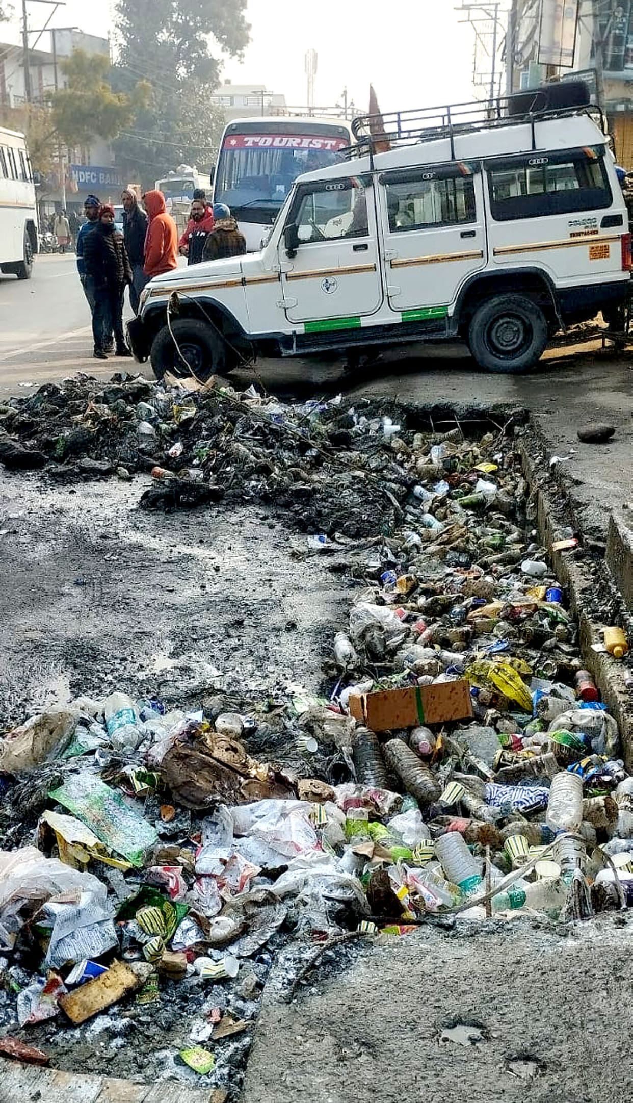 Corporation forgot to clean drains and collect garbage