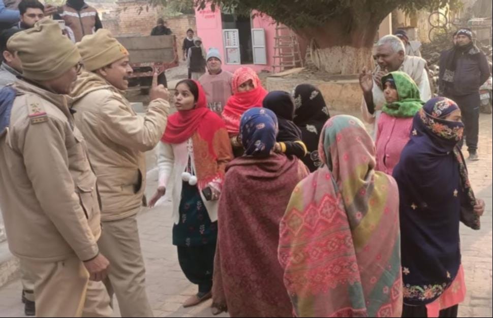 Two accused wanted under Gangster Act arrested, family members created ruckus