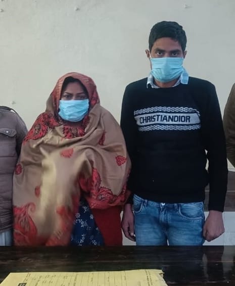 The son along with his wife painted their hands with mother's blood
