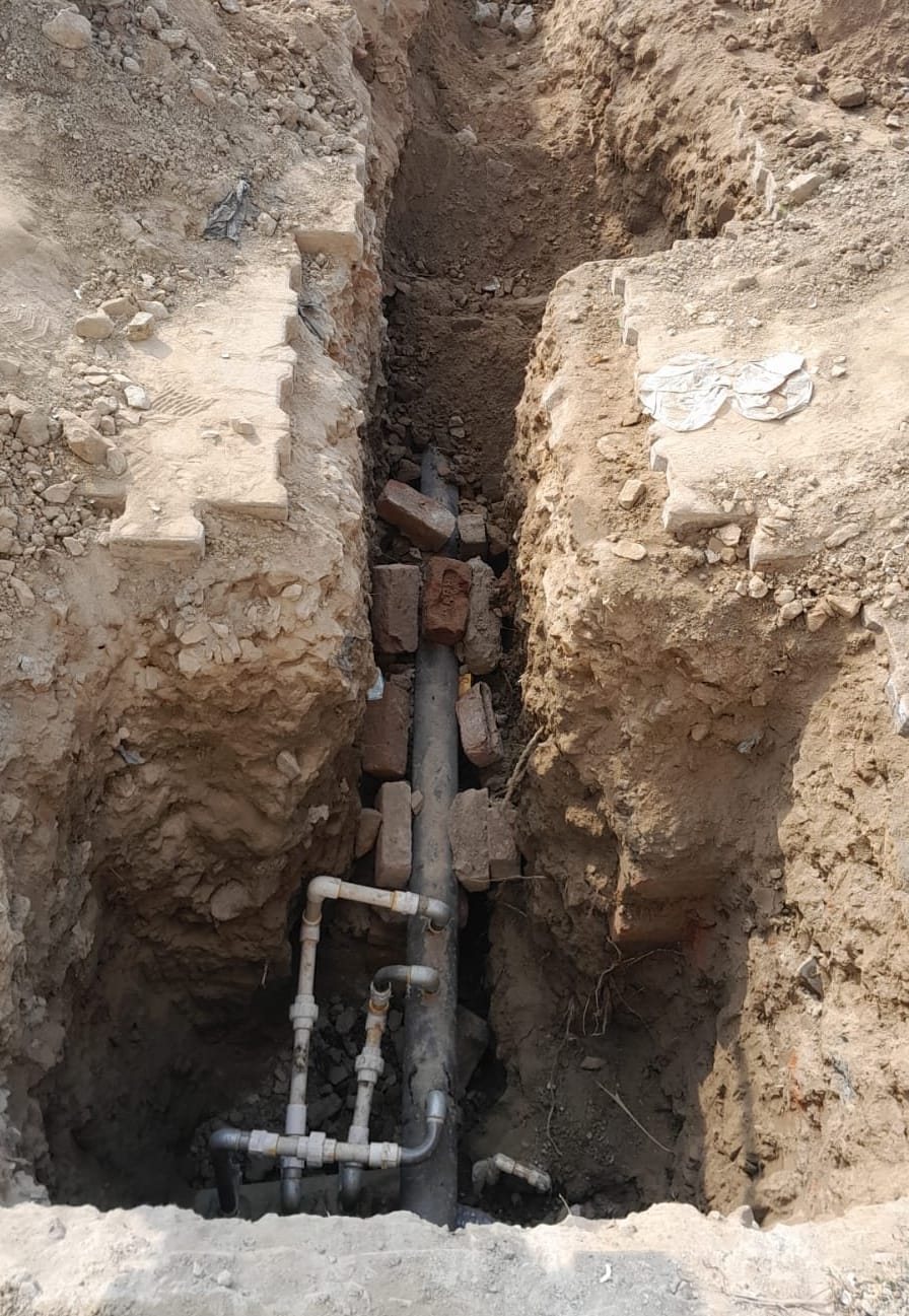 Drinking water pipeline leaked and at some places pits were not filled by pressing pipes