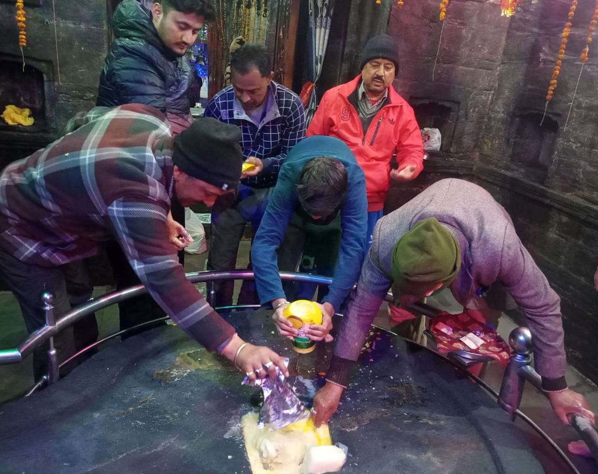 Baba Bagnath covered with ghee