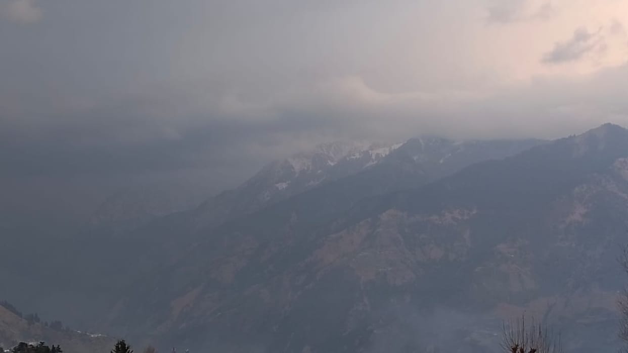 Snow on the high peaks of Munsiyari