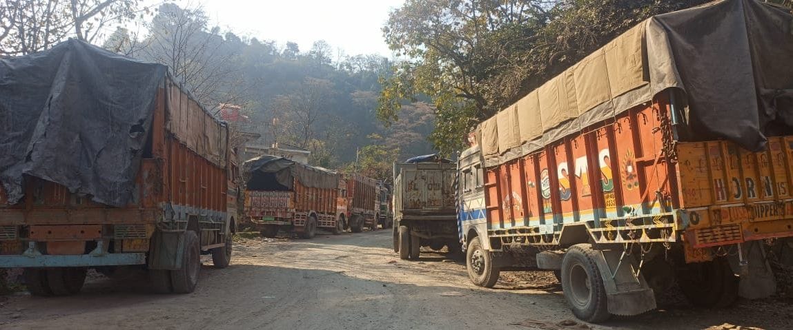 Operators parked trucks on Pathankot-Bharmaur highway