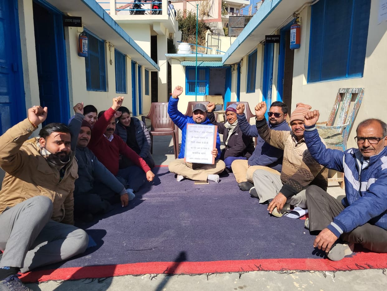 Protest against giving the work of departments to private institutions