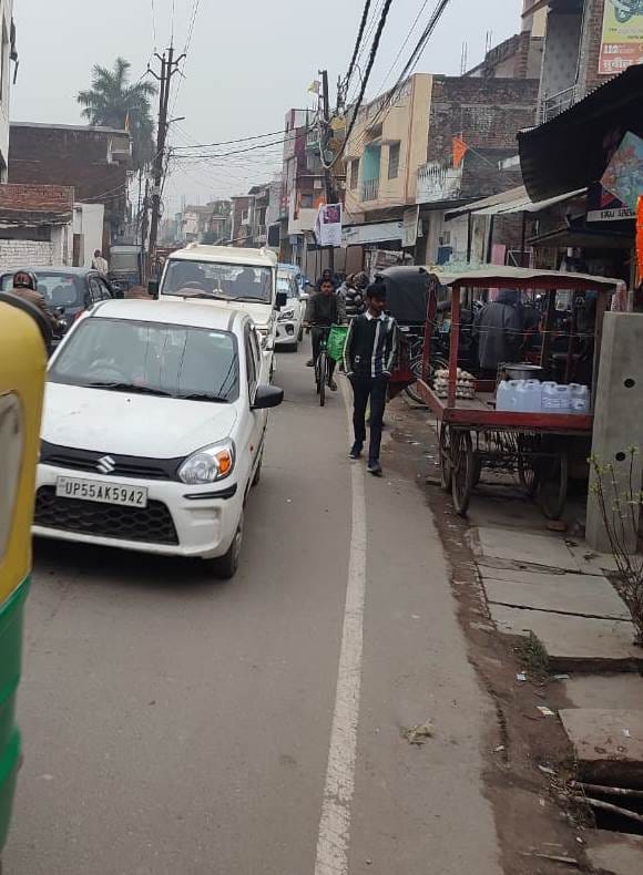 Road reduced to four meters due to encroachment...drains also encroached upon