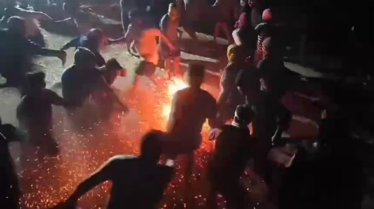 Unique tradition: People jumped barefoot on embers