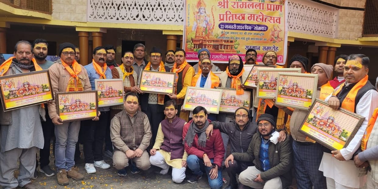 Karsevaks were honored by giving them a patka and a picture of the temple.