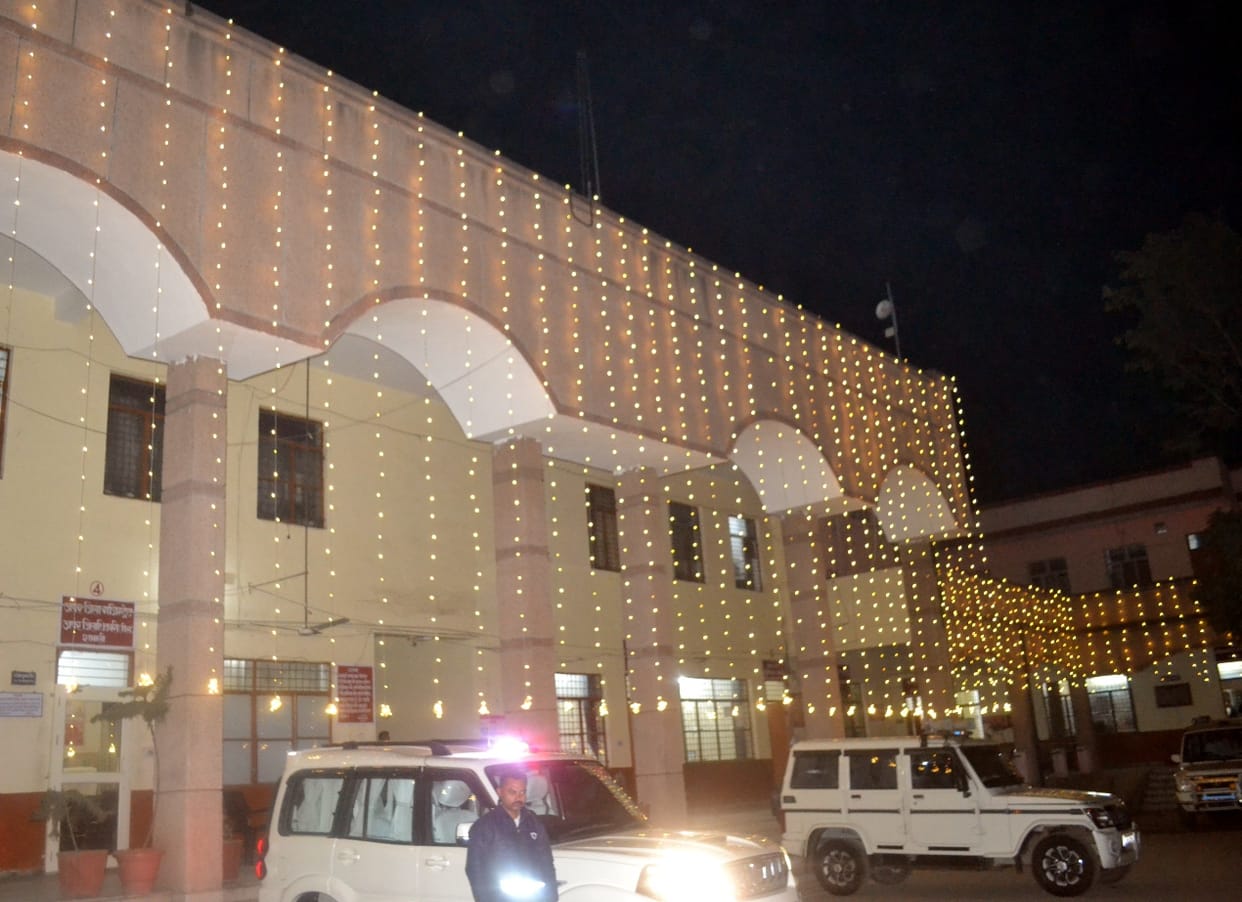 Government and non-government offices lit up with colorful lights