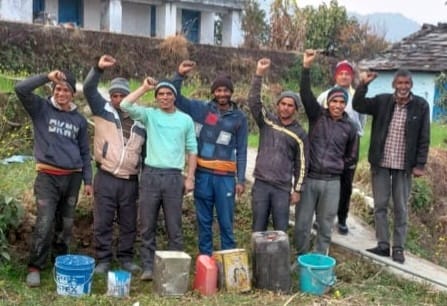 Demonstration of villagers carrying empty vessels in their hands for water