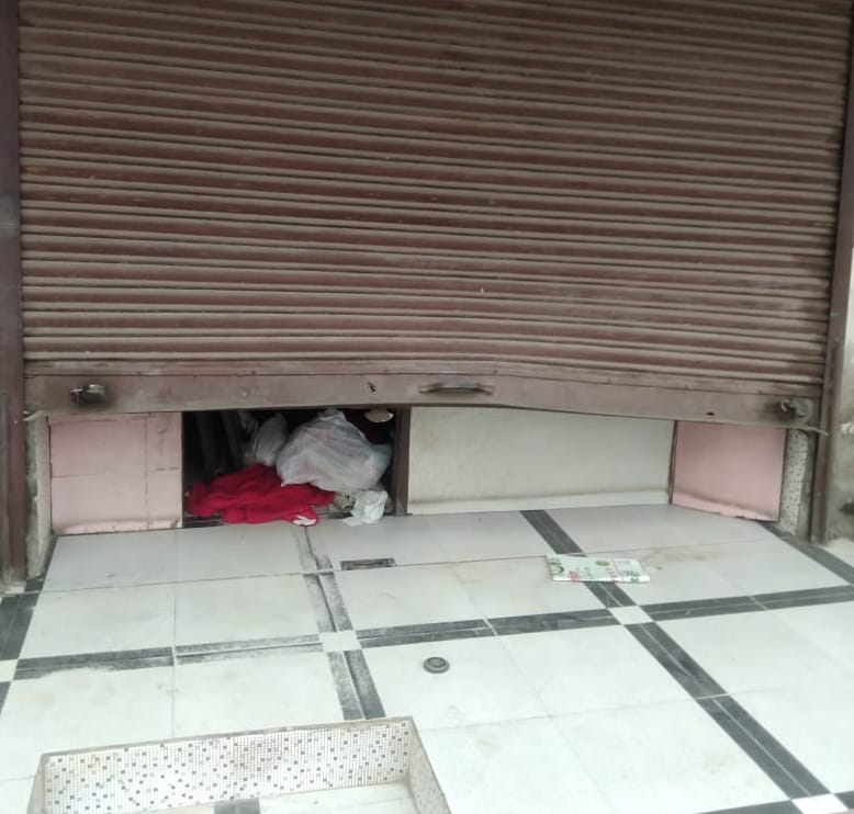 Thieves took away cash by uprooting the shutters of two shops in Shivaji Colony Market.