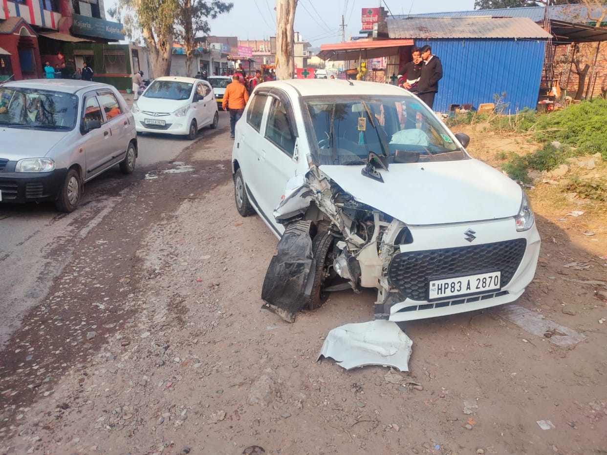 Car collides with K, female driver injured