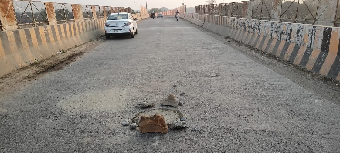 Railway officers came into action, got the overbridge road repaired
