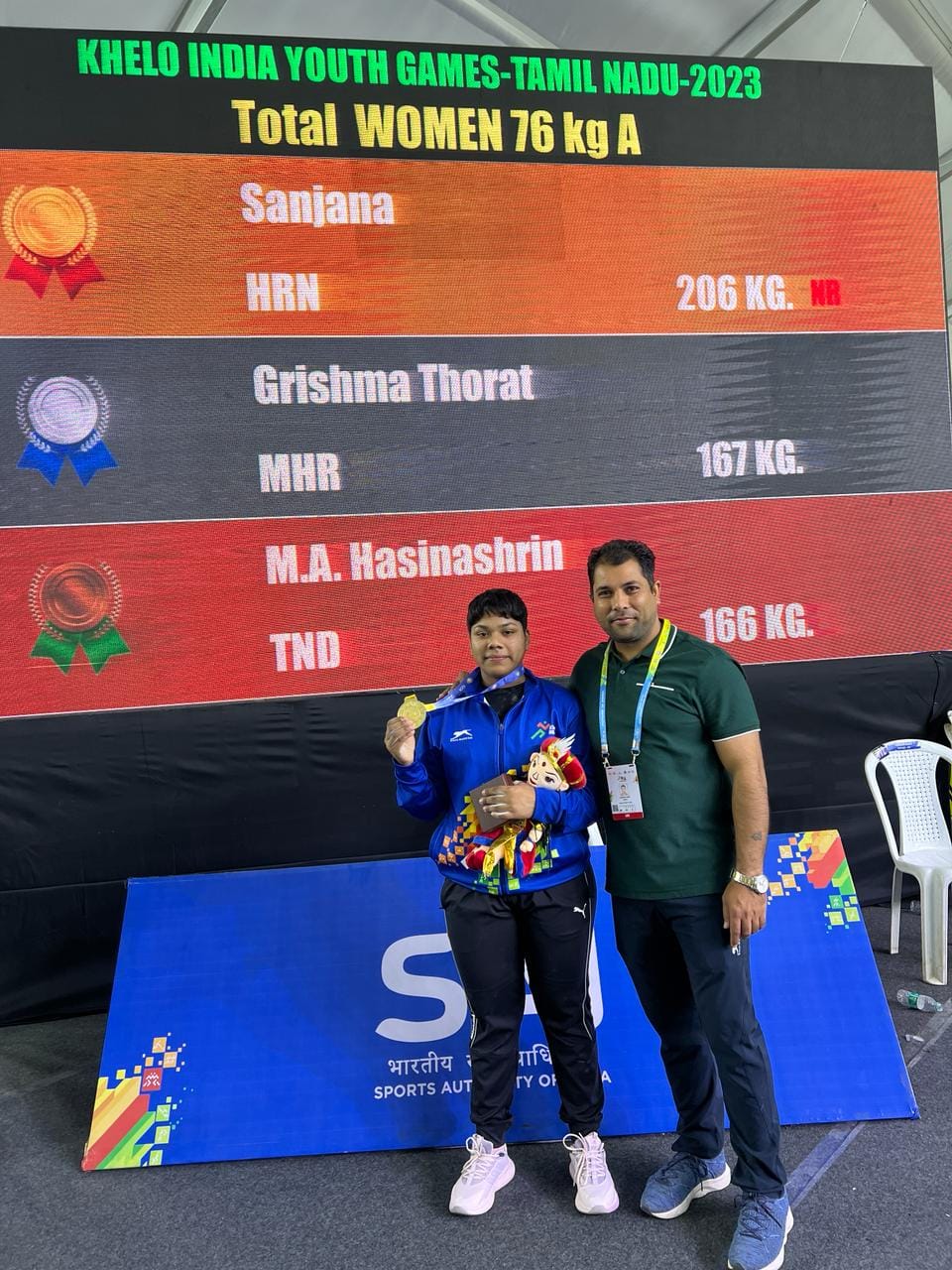 Weightlifting medal winner with Sanjana Koch