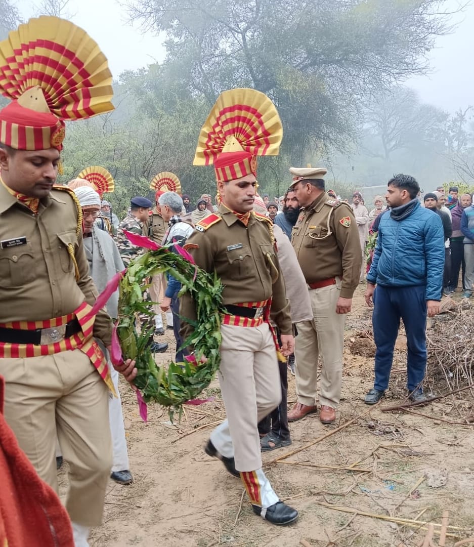 Villagers bid last farewell to the soldier with tearful eyes
