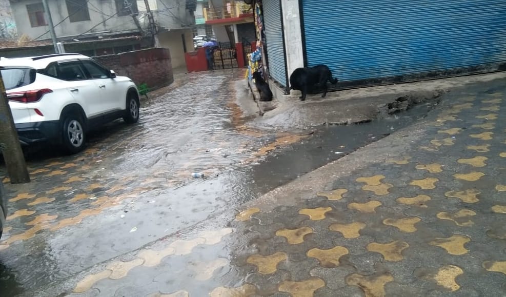 Roads filled with rain, pedestrians worried