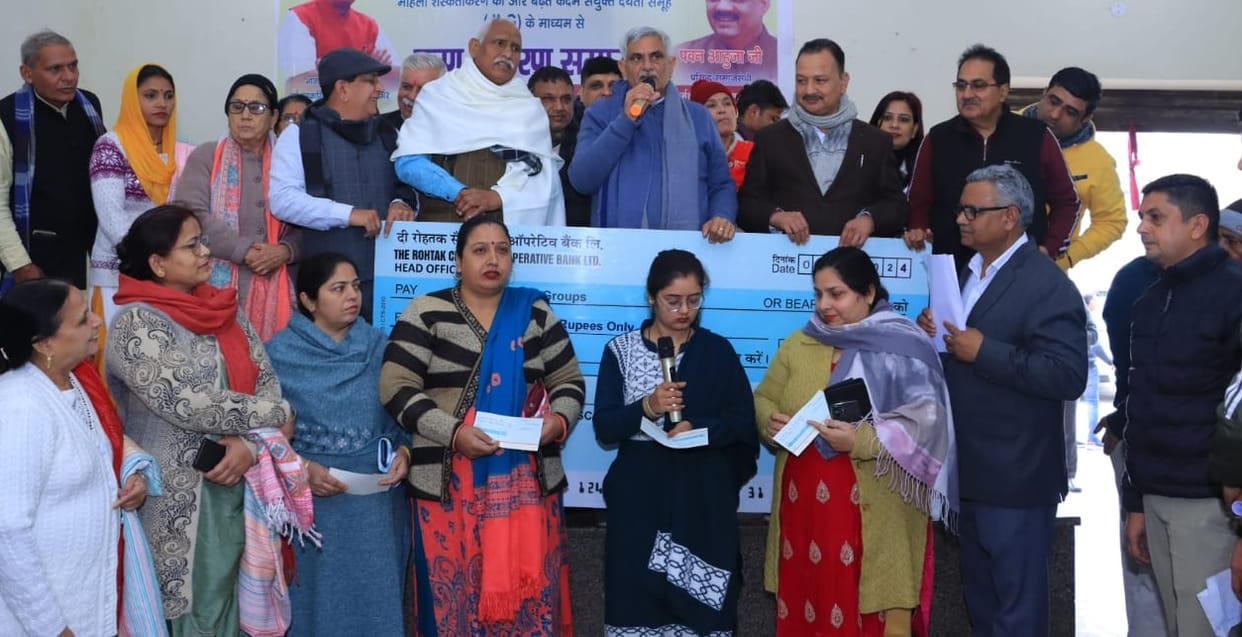 Former minister Grover distributed checks worth Rs 50 lakh to women