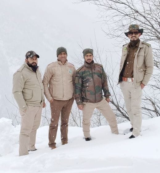 Employees engaged in protecting wild animals between four feet