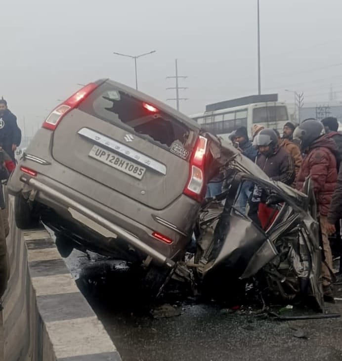 Car collides with roadways bus and climbs on divider, five injured