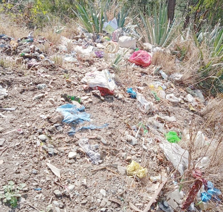 Cleaning of streets, disposal of dirt on hill