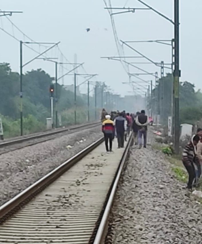 Woman dies after being hit by train