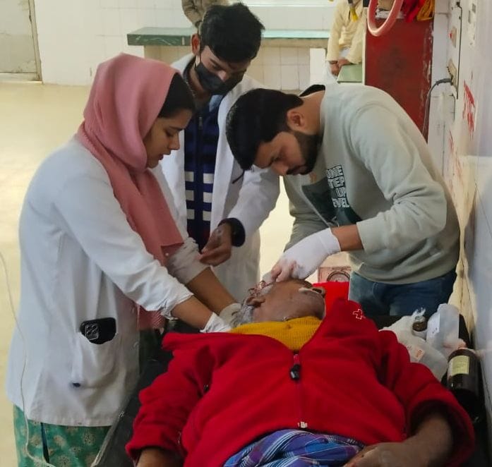 Car collides with school van, 12 injured including 10 children