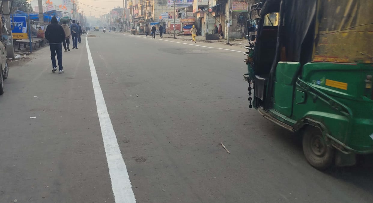 If vehicle is parked outside the white strip, challan will be issued