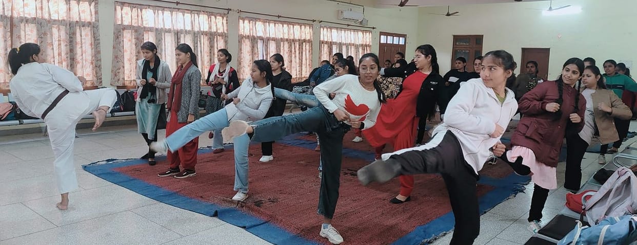 Girl students learned self defense skills from kick