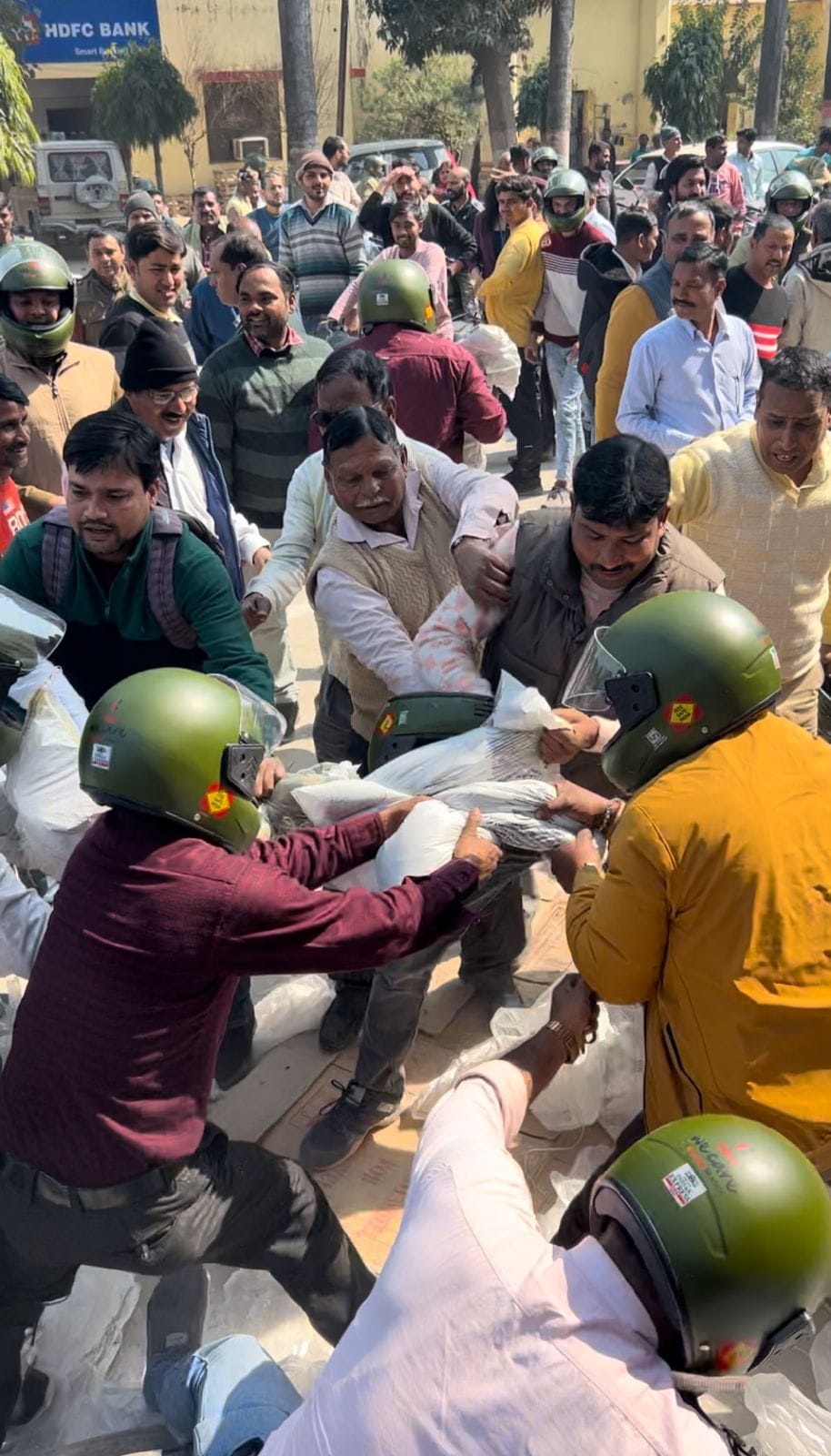 Had come to distribute helmets and jackets. When looted, they ran away to save their lives.