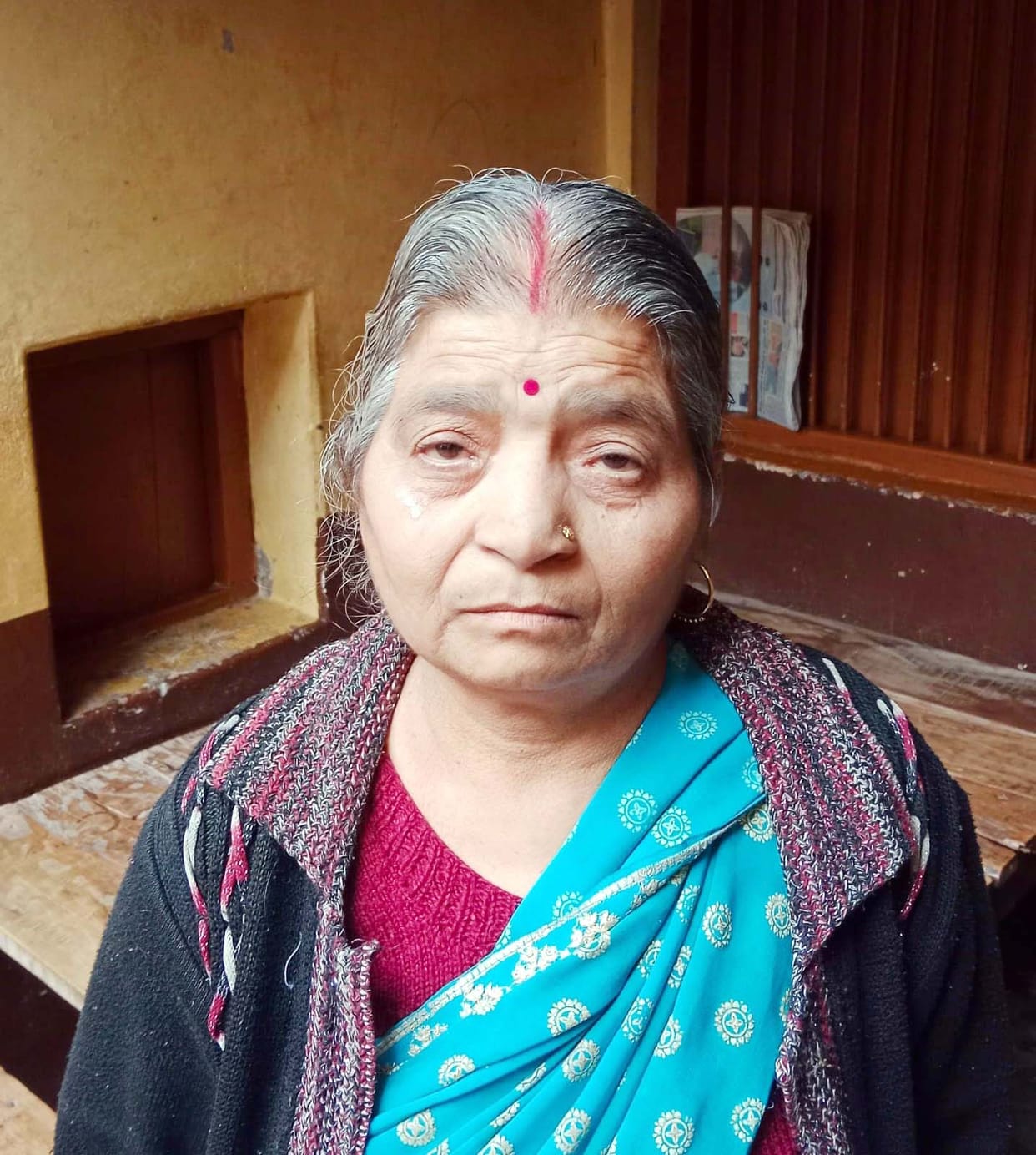 Amidst the dense population, a stranger tore a woman's earring.