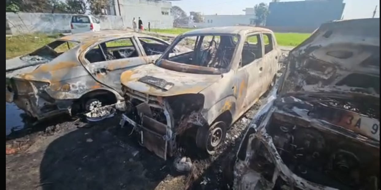 Garbage was burning in the plot, three cars burnt